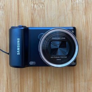 Samsung WB200F. 14 megapixels, 18X zoom, Wi-Fi image transfer.